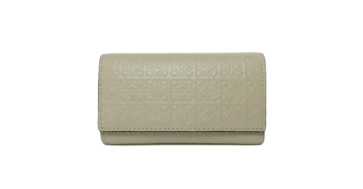 Estuche para llaves con patrón de anagrama Loewe Repeat Beige 