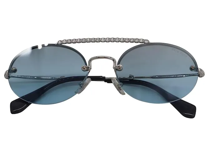 Gafas de sol ovaladas con barra de diamantes de imitación en metal azul claro de Miu Miu 