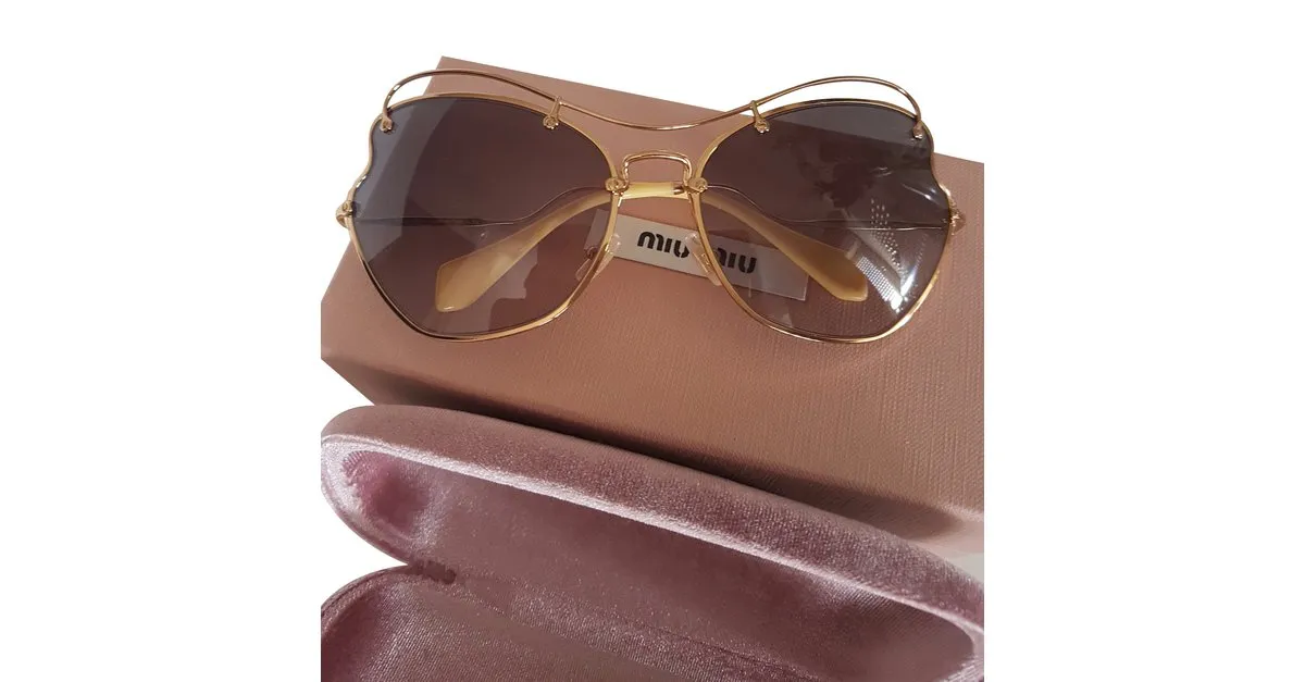 Miu Miu Gafas de sol Dorado 