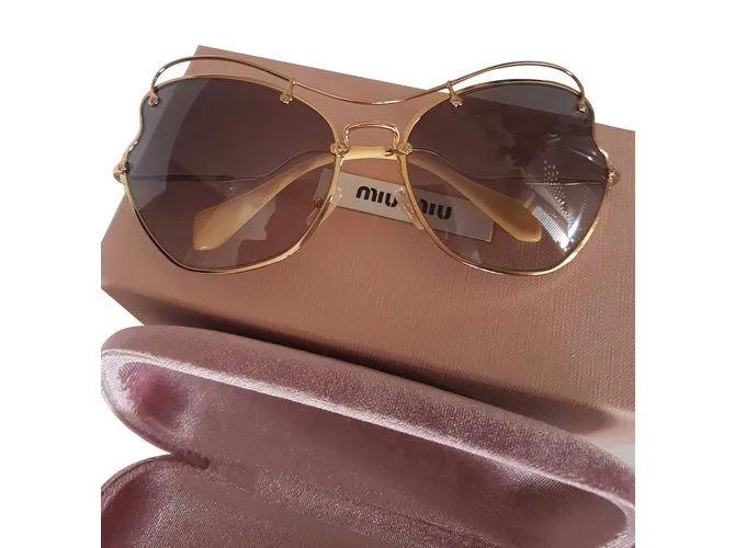 Miu Miu Gafas de sol Dorado 