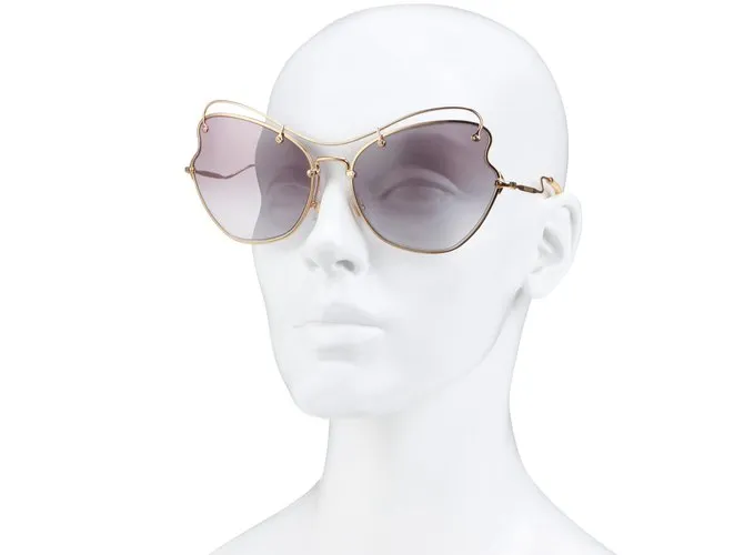 Miu Miu Gafas de sol Dorado 