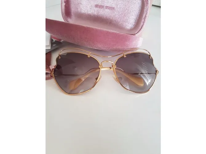 Miu Miu Gafas de sol Dorado 