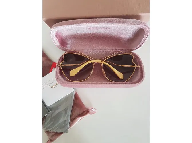 Miu Miu Gafas de sol Dorado 